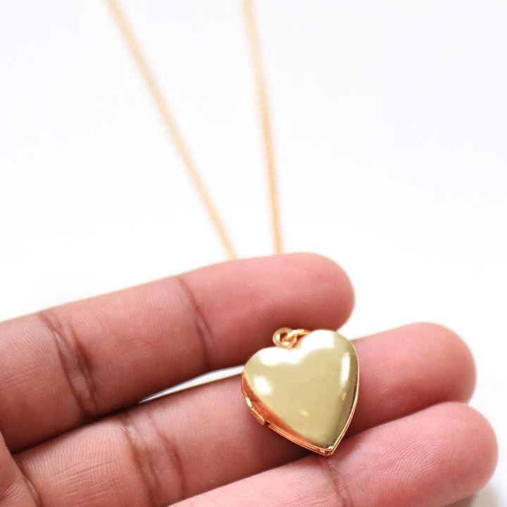 Heart locket necklace gold color with picture inside